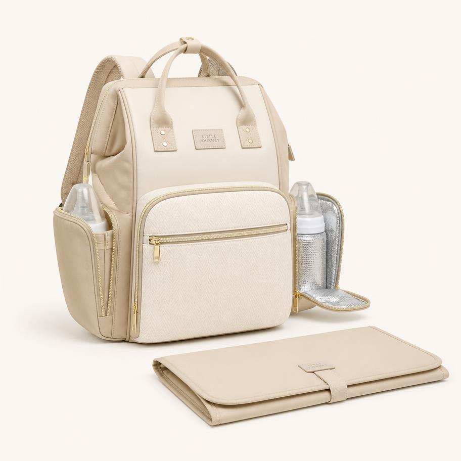 Everyday Diaper Backpack — Organised backpack with insulated bottle pockets and a changing mat.